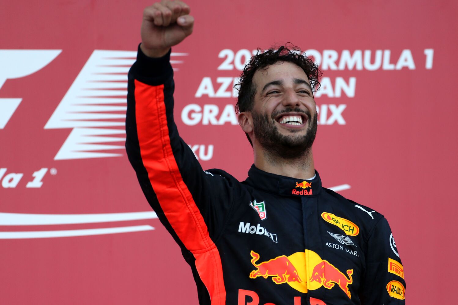 Daniel Ricciardo celebrating on the podium in Baku