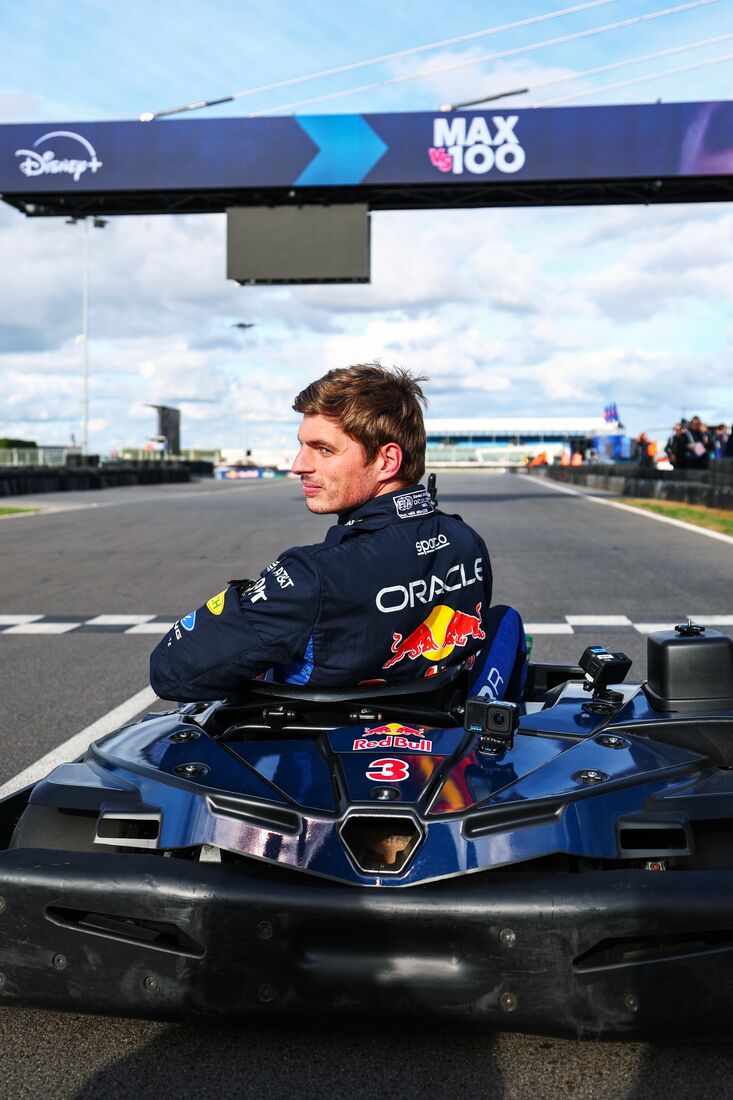 Max Verstappen at the wheel of a kart
